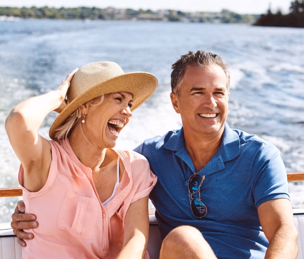 A couple on a yacht cruise.