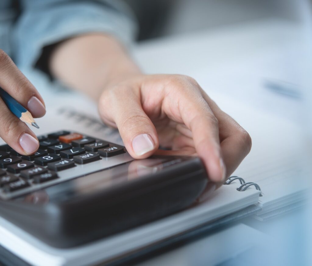 A person using a calculator.
